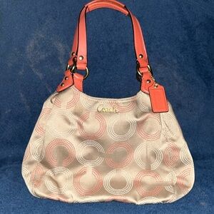 Pink and tan coach shoulder bag
